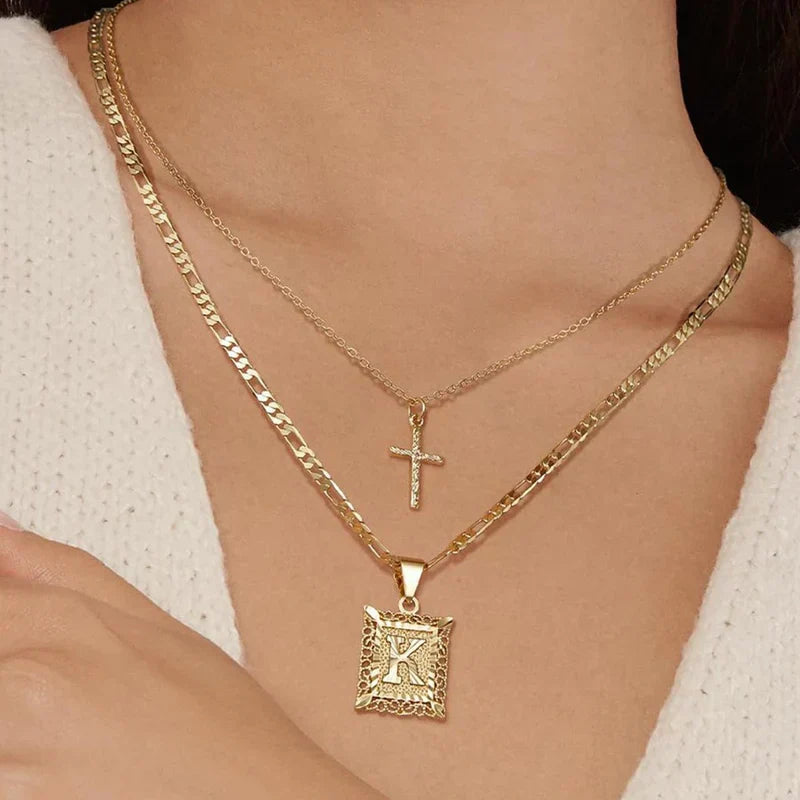 Set de Collar con Inicial y Cruz | Oro