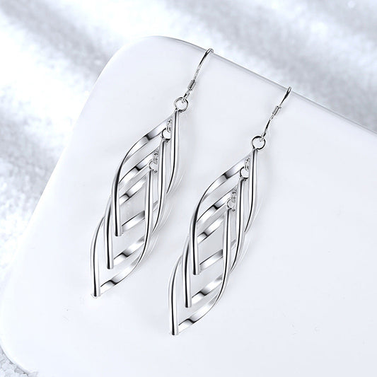 Aretes de Onda Woven Solenne | Oro blanco