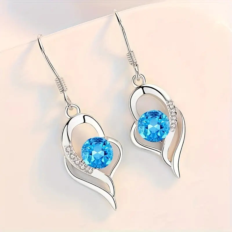 Aretes Colgantes de Corazón Eclipse | Oro blanco