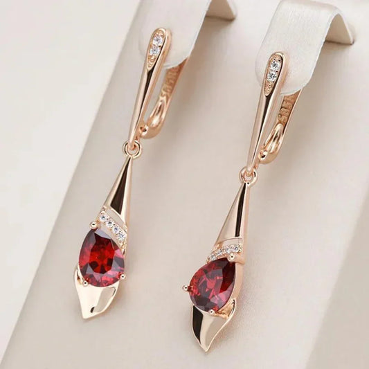 Aretes Exquisitos con Colgante de Cristal Rojo | Oro