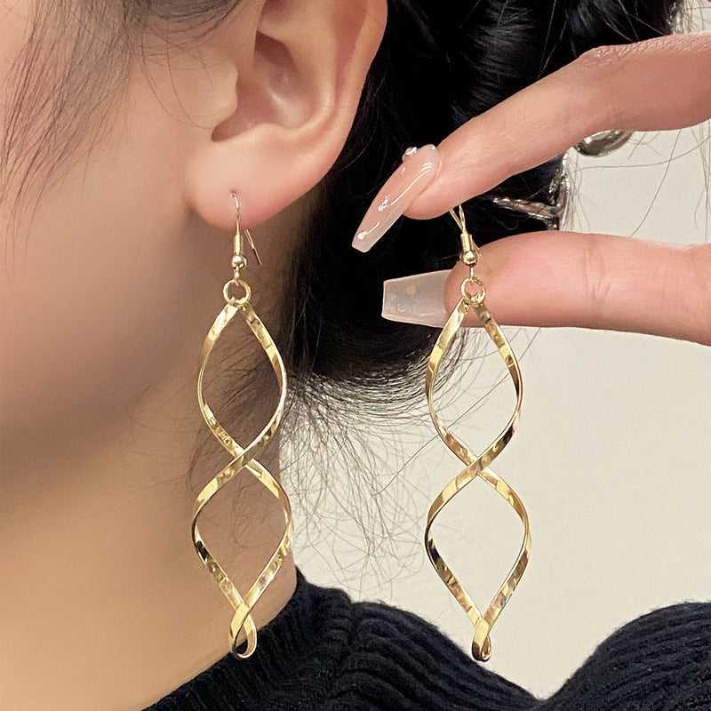 Aretes Colgantes Espiral | Oro