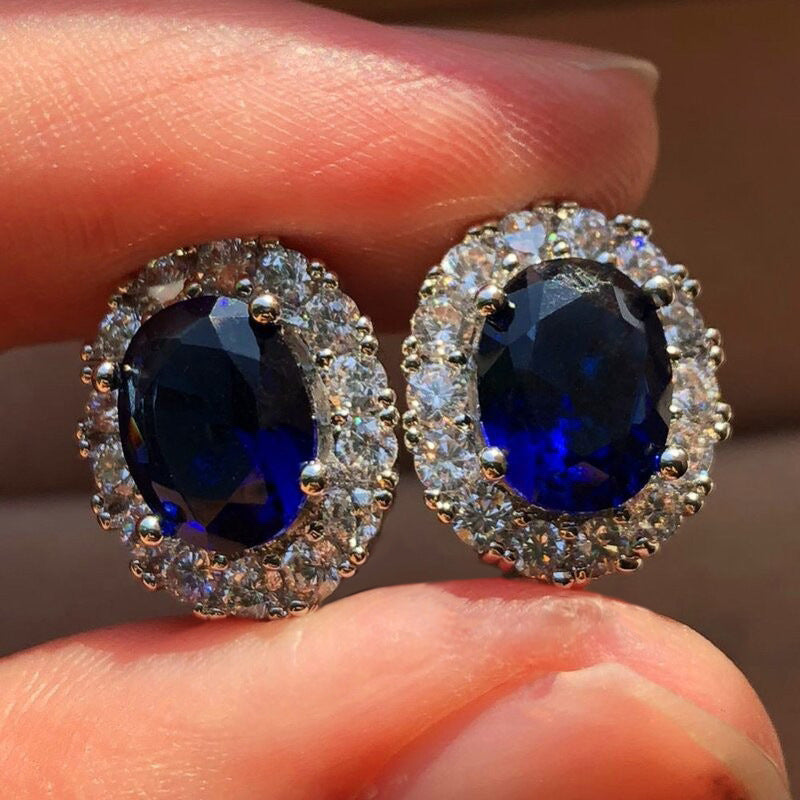 Aretes de Botón Ovalados Blanco Zafiro | Oro blanco