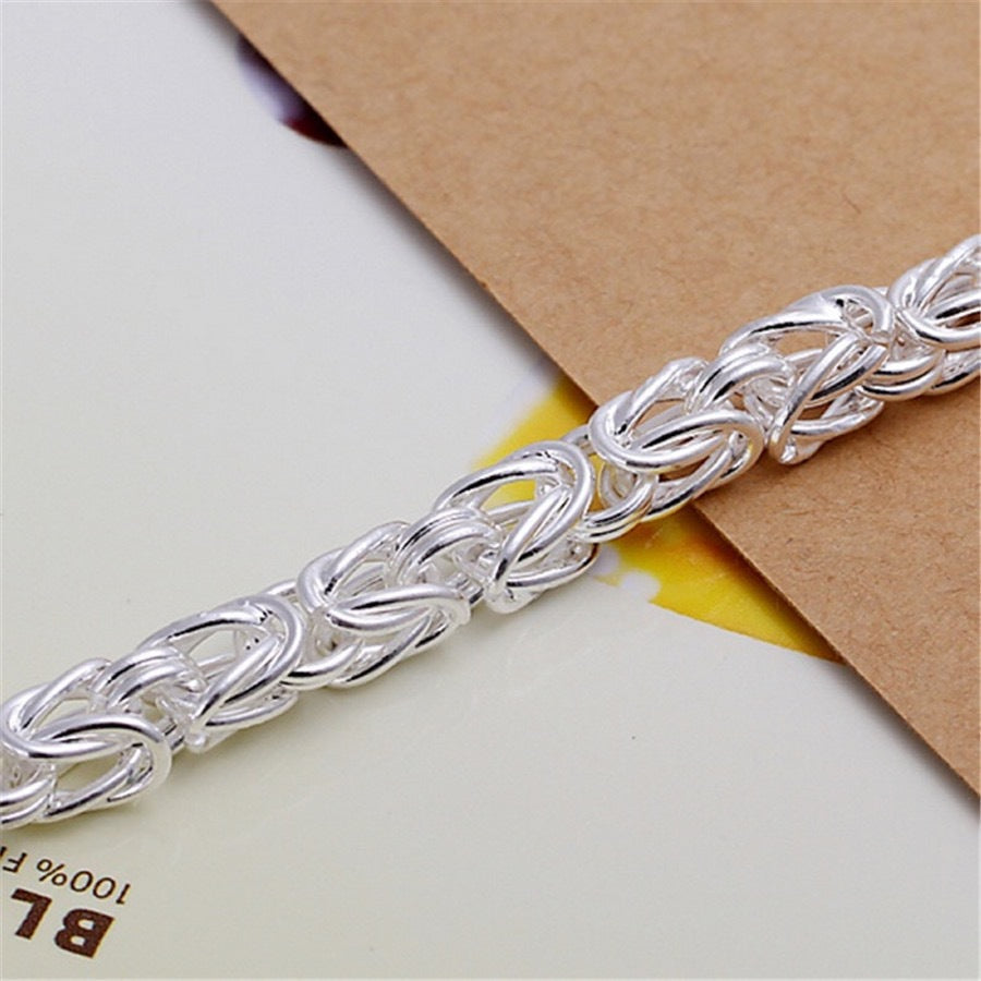 Pulsera Maximus Royal Weave | Oro blanco