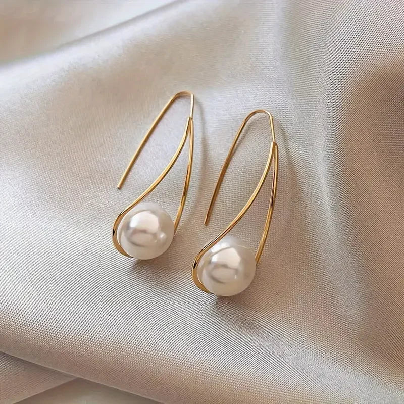 Aretes Elegantes de Perla Dangling | Oro