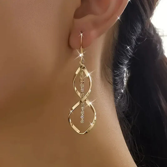 Aretes Espiral Rayo de Sol | Oro